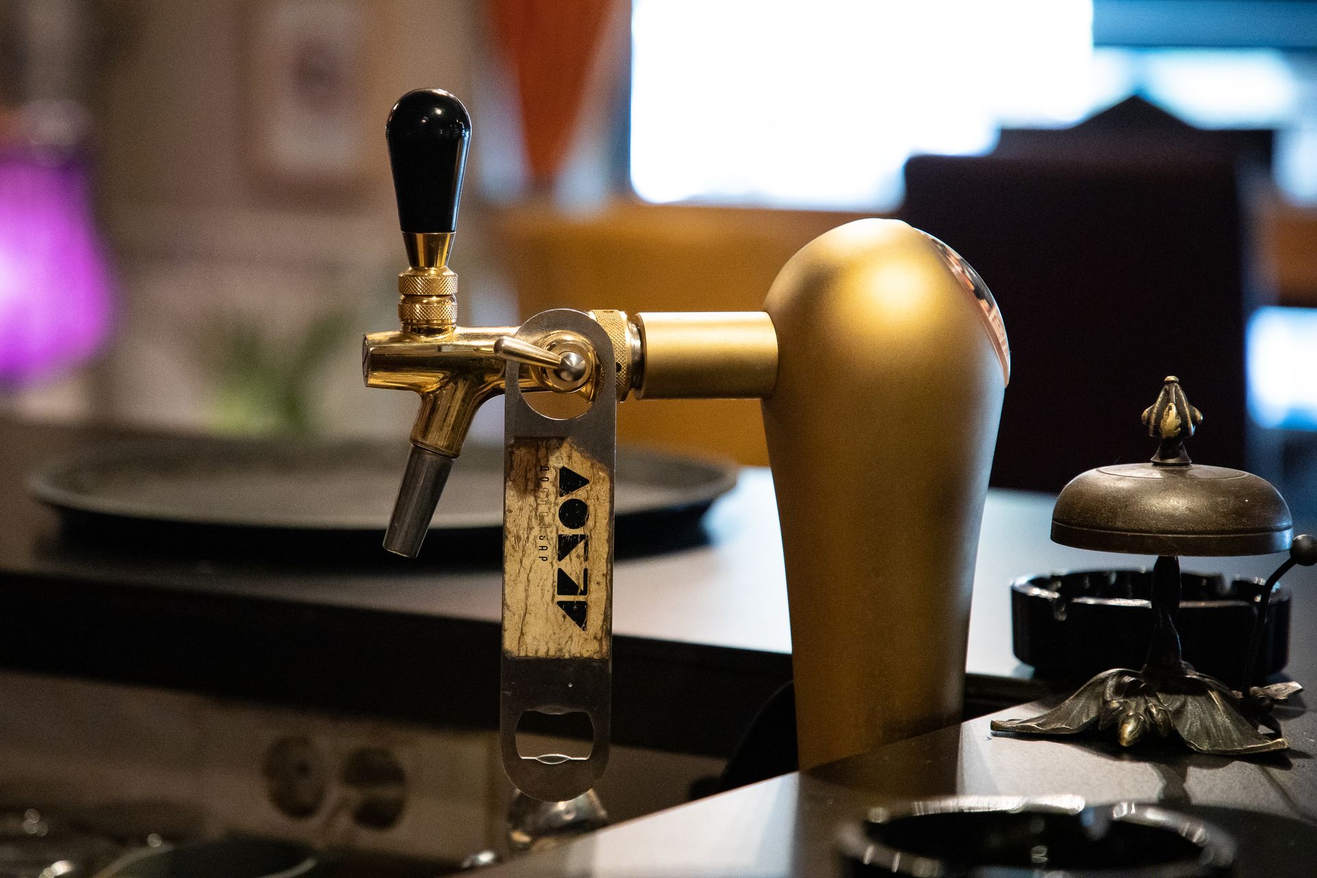 Close up of Golden Dispenser behind Counter