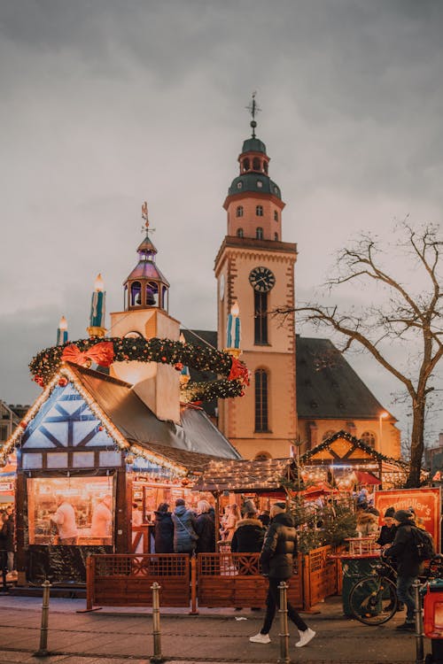 People at Christmas Market near Saint Catherine Church in Frankfurt, Germany