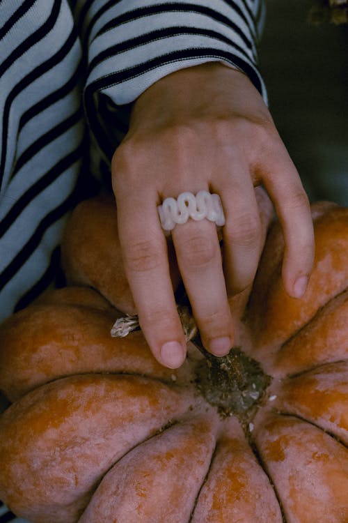 Hand on Pumpkin