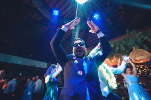 Free Energetic nightclub scene showing people dancing and enjoying a night out. Stock Photo