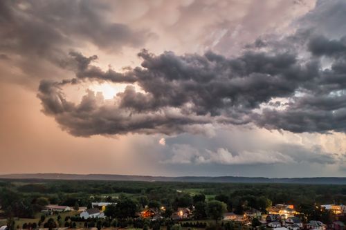 Free Aerial view of storm clouds looming over Nelson, Wisconsin, showcasing dramatic weather. Stock Photo