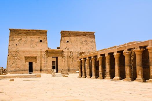 Explore the grandeur of an ancient Egyptian temple adorned with intricate carvings and stone columns.