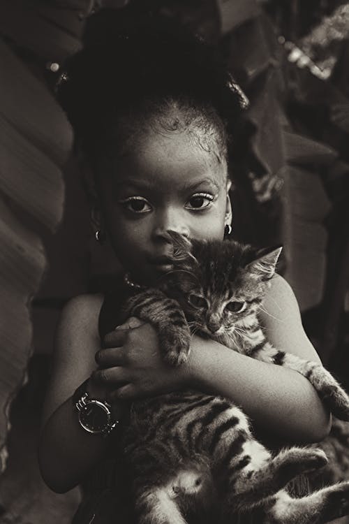 Portrait of Girl with Kitten in Black and White
