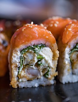 Mouth-watering sushi roll with salmon, rice, and sesame in a close-up shot.