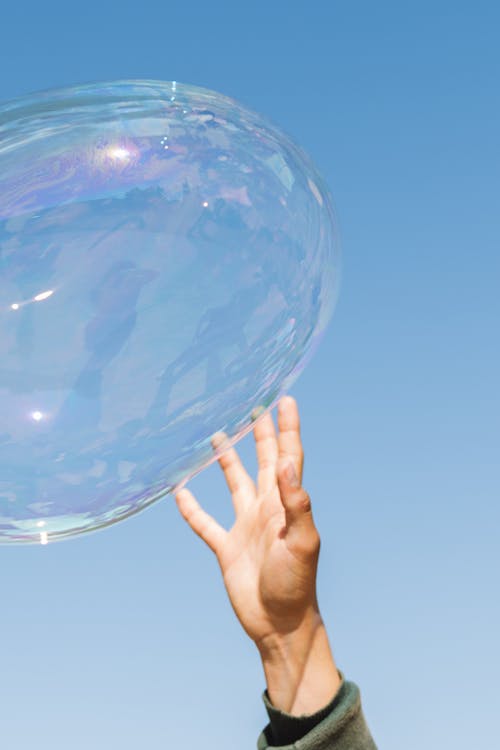 Free Hand Catching Bubble Stock Photo