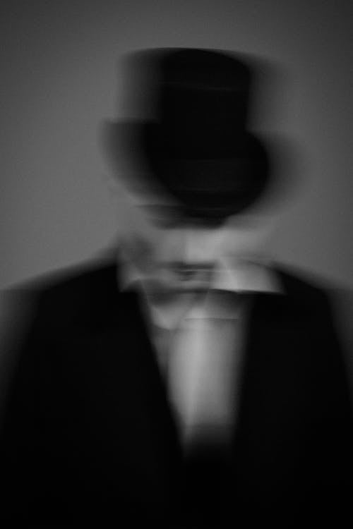 Blurred Portrait of a Man in a Tall Hat 