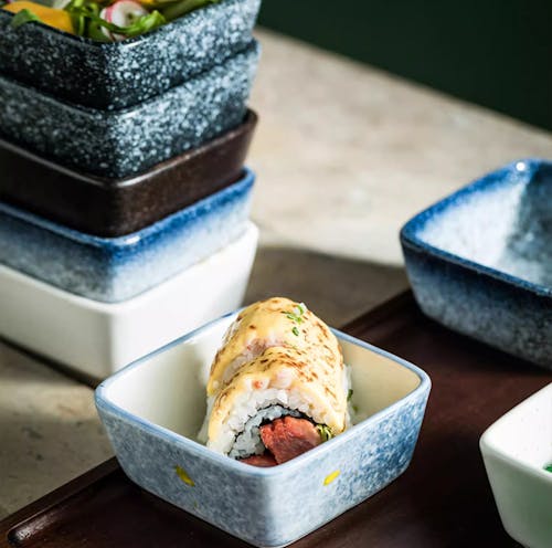 Close-up of Sushi in a Ceramic Bowl 