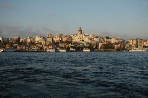 Free Scenic view of Istanbul's cityscape featuring Galata Tower and Bosporus at dusk. Stock Photo