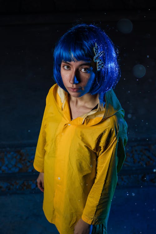 Model in Yellow Shirt and with Dyed, Blue Hair