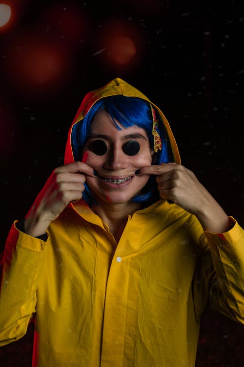 Portrait of Woman in Yellow Shirt and with Blue Hair