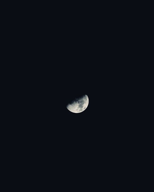 High-resolution image of a crescent moon against a dark night sky.