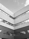 Black and White Photo of a Modern Building Facade