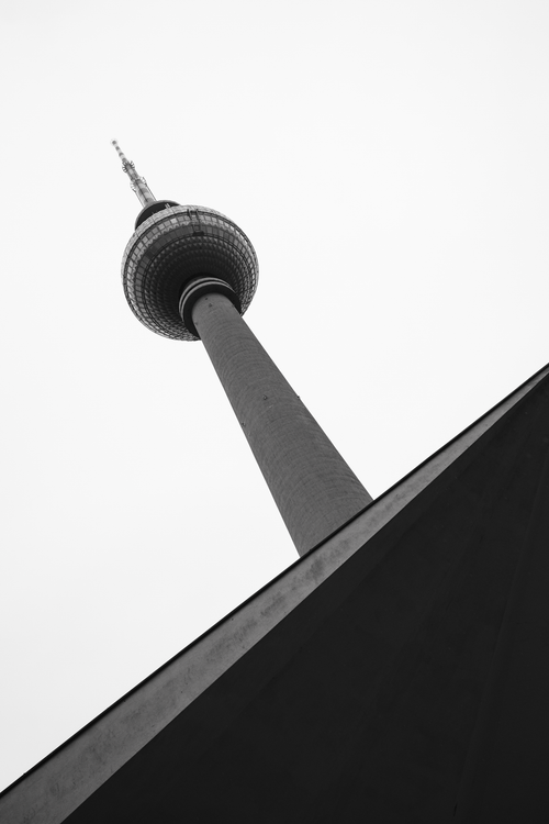 Free A striking low angle shot of Berlin's Fernsehturm in black and white. Stock Photo
