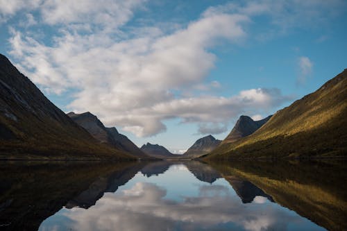 Free View of Fjords and Sky Reflecting in the Water  Stock Photo
