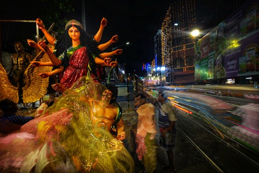 Colorful celebration of Durga Puja in Kolkata, India, showcasing traditional art and vibrant night lights.