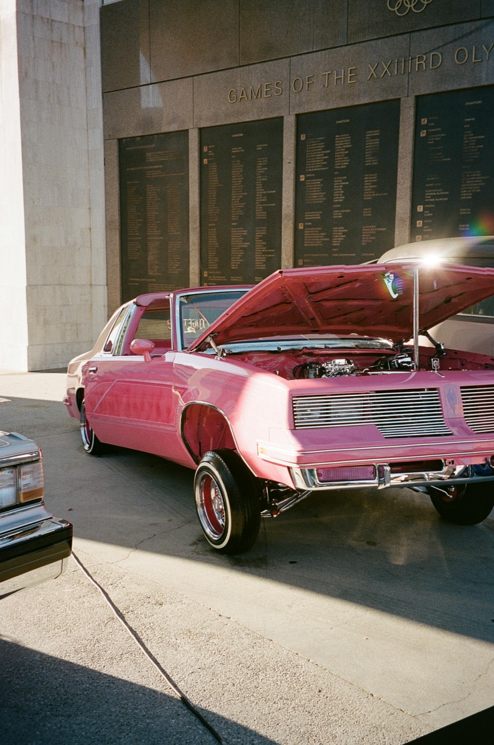 Pink Vintage Car with an Open Hood · Free Stock Photo Pink Vintage Car with an Open Hood · Free Stock Photo
