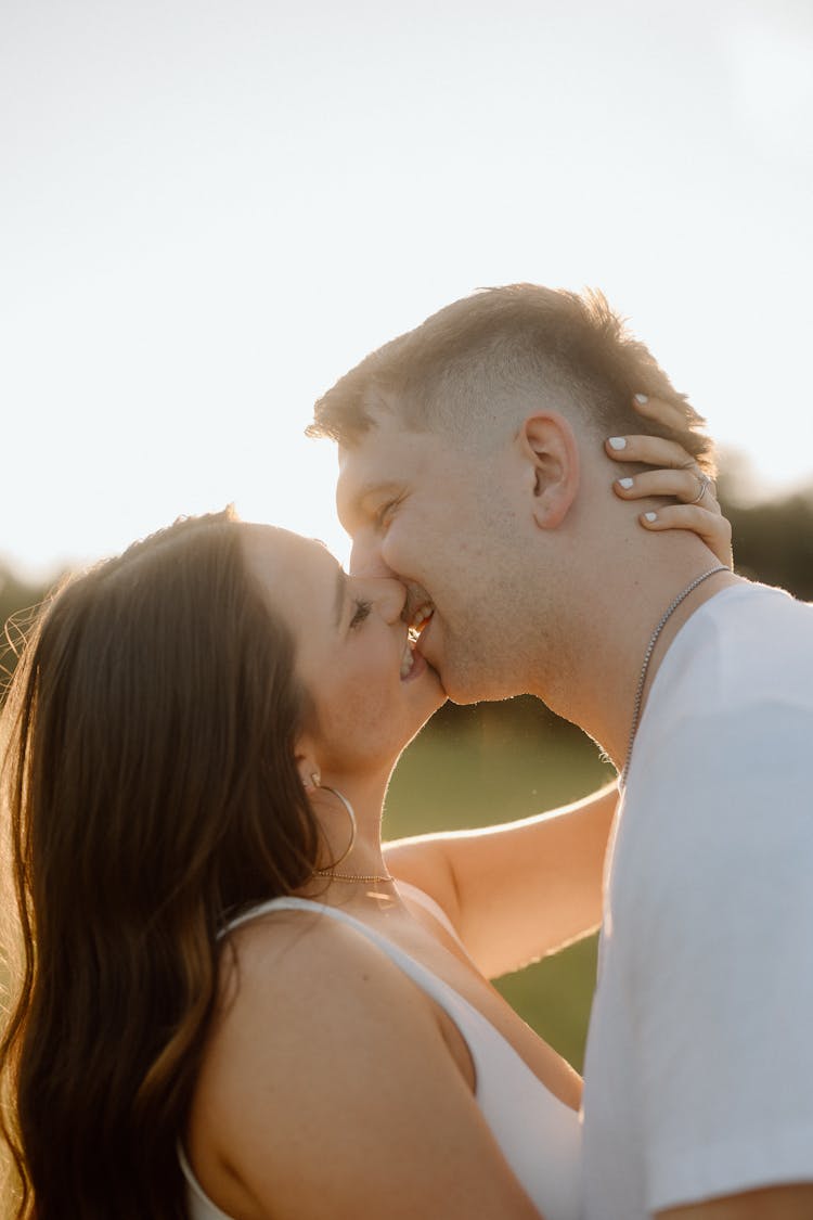 Portrait Of Couple Kissing