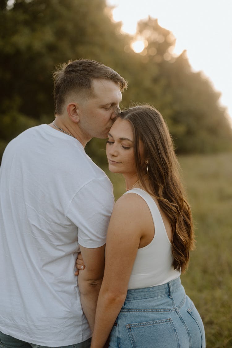 Back View Of Kissing Couple