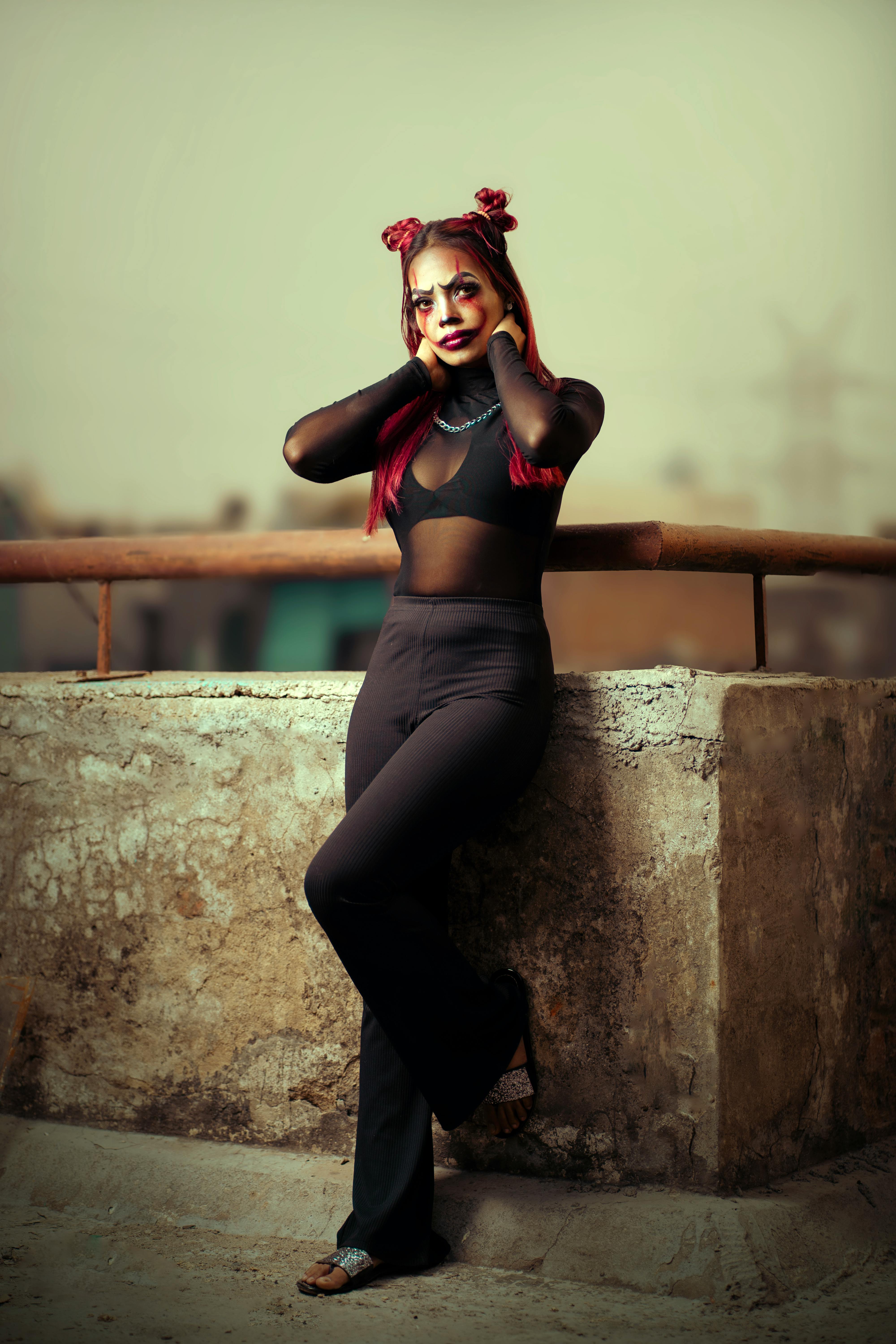 woman in halloween makeup and black outfit