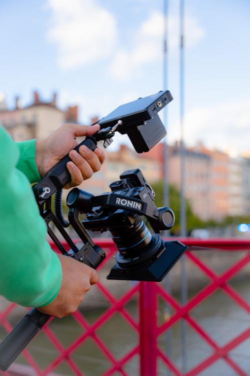 Cameraman Holding a Professional Video Camera Rig