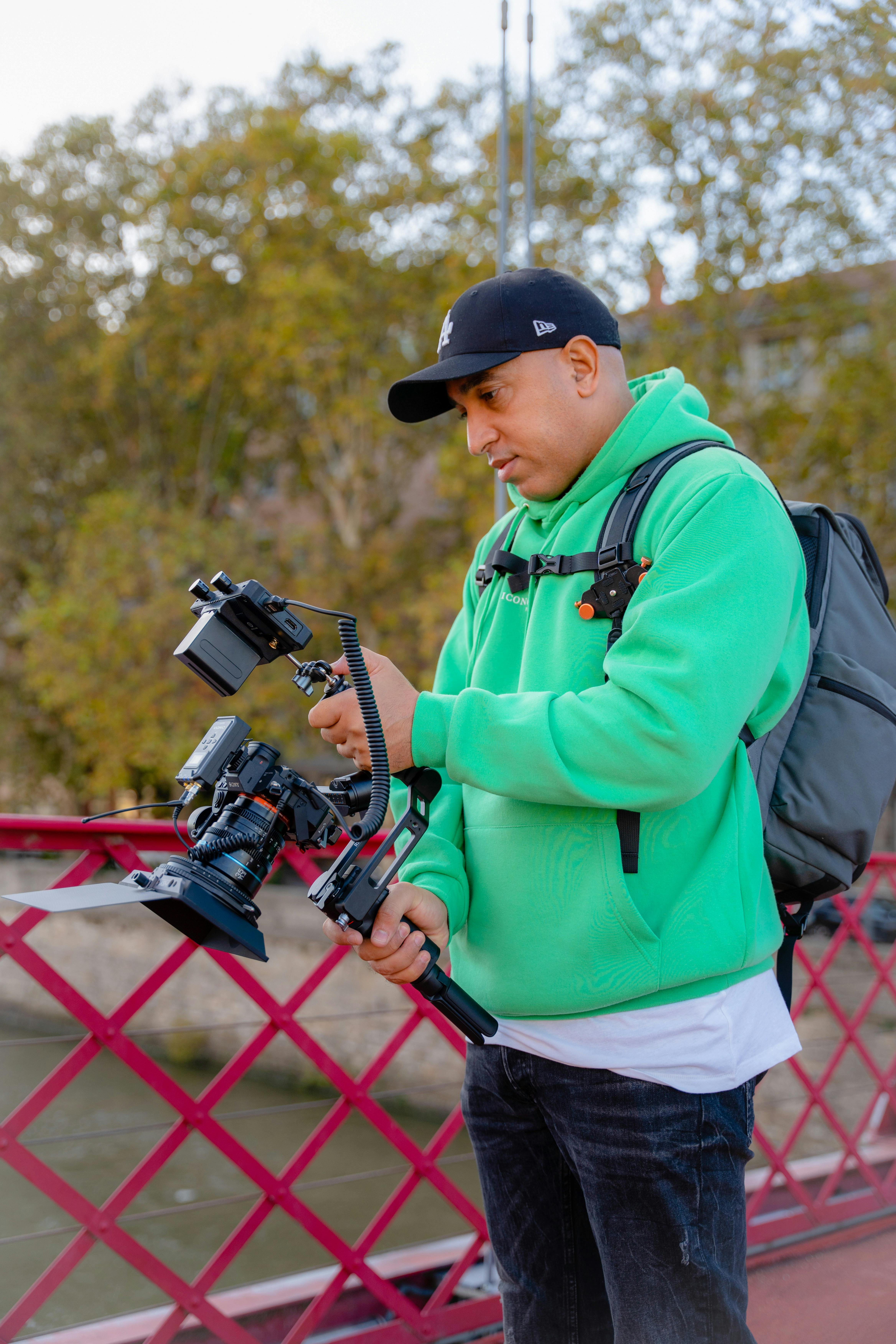 man holding a professional camera