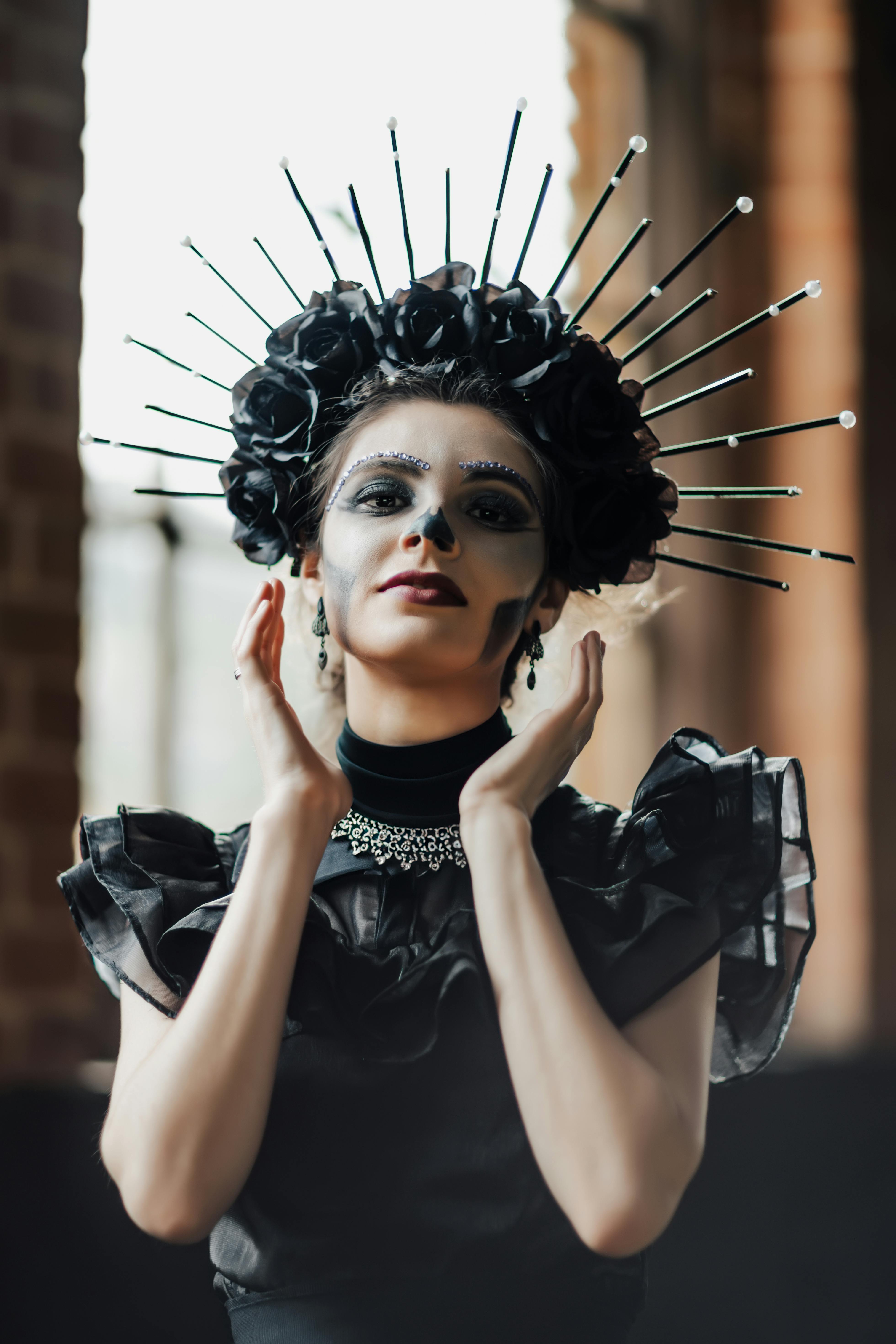 Woman Wearing a Black Dress and Makeup for Halloween · Free Stock Photo