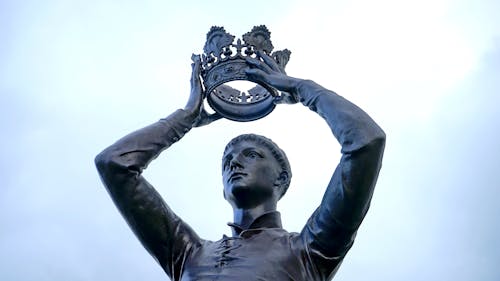 Boy Wearing Crown Statue