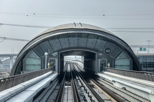 Free A view of the sleek design of a Dubai Metro tunnel entrance, showcasing modern transportation infrastructure. Stock Photo