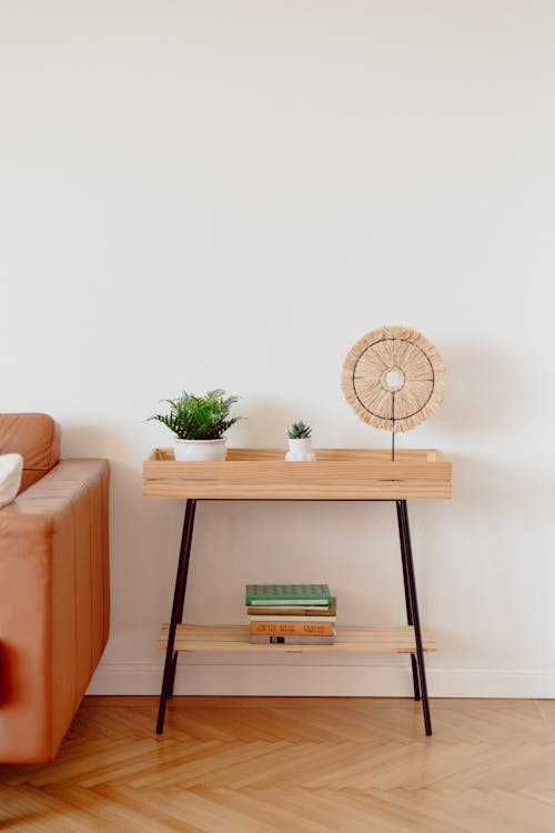 Table with Shelf by White Wall