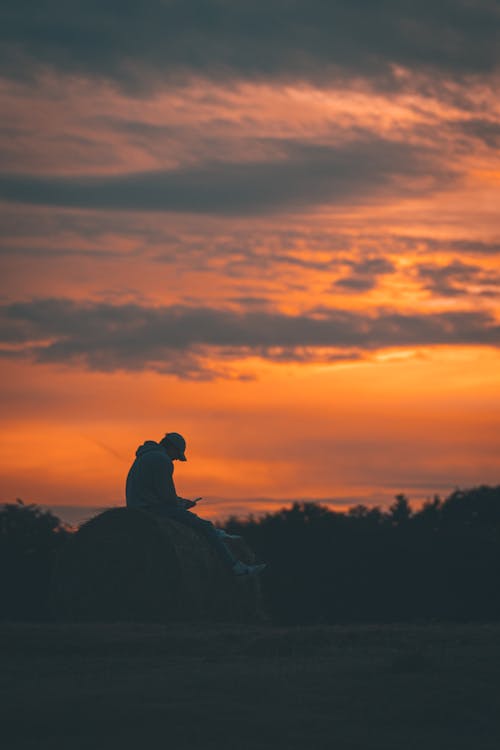 Silhouette of a Man During Sunset