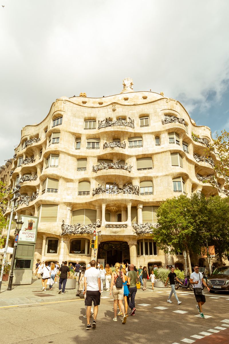 The rippling stone facade and iron balconies of Casa Milà (La Pedrera) in Barcelona