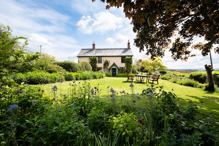 House Building On A Farm In Summer 