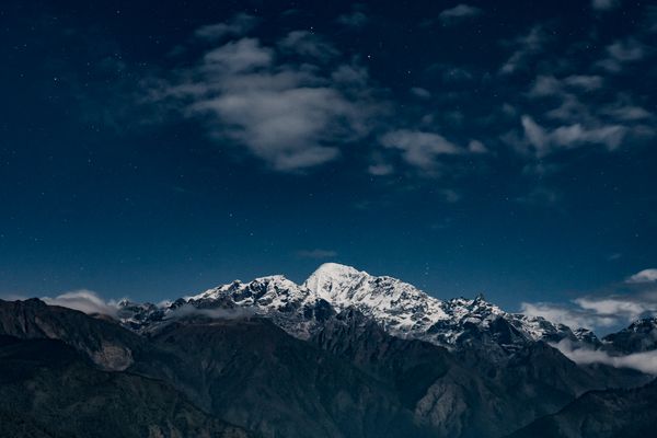 A Snow Covered Mountain Under the Starry Sky · Free Stock Photo