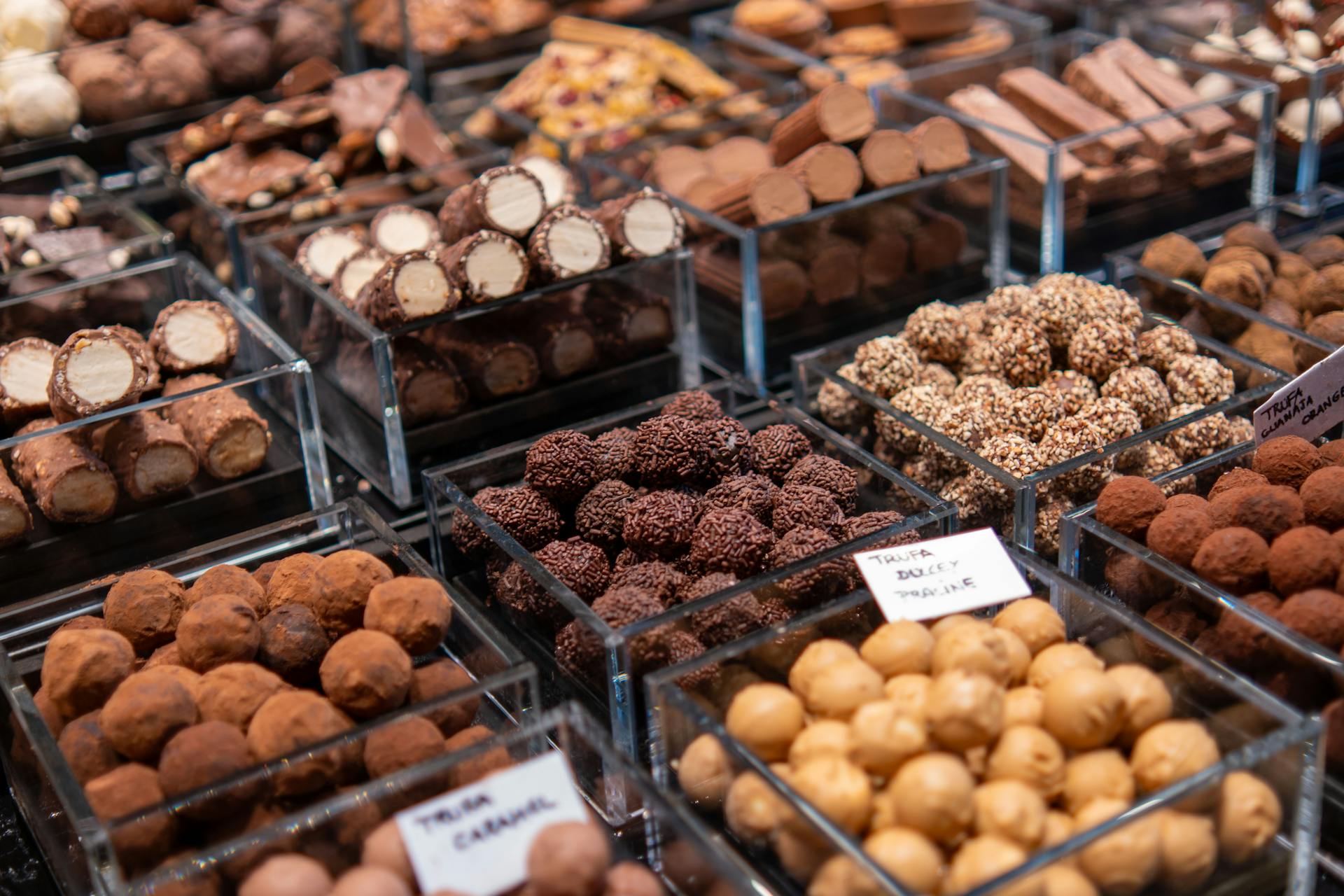 Pralines in Containers on a Market