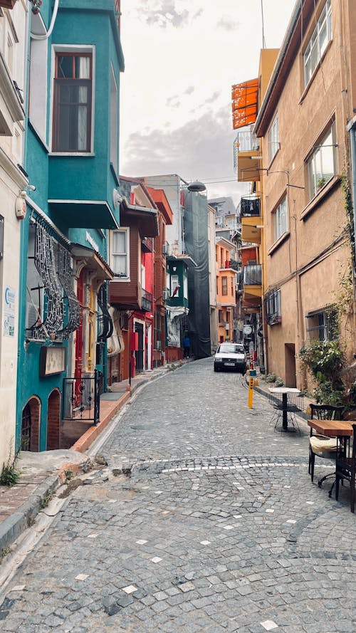 Cobblestone Street Between Colorful Townhouses of Istanbul