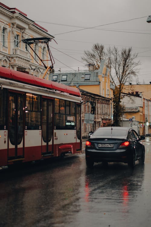 Tram and Car on a Street