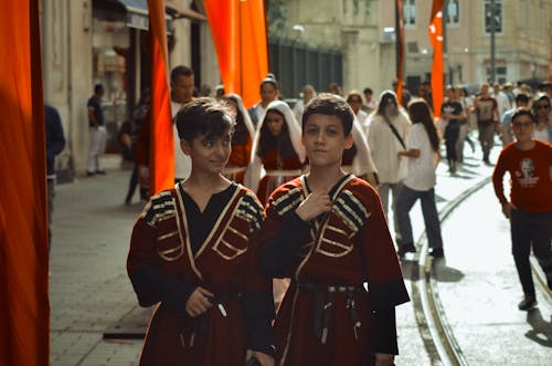 Boys in Traditional Clothing on Cicek Pasaji in Istanbul