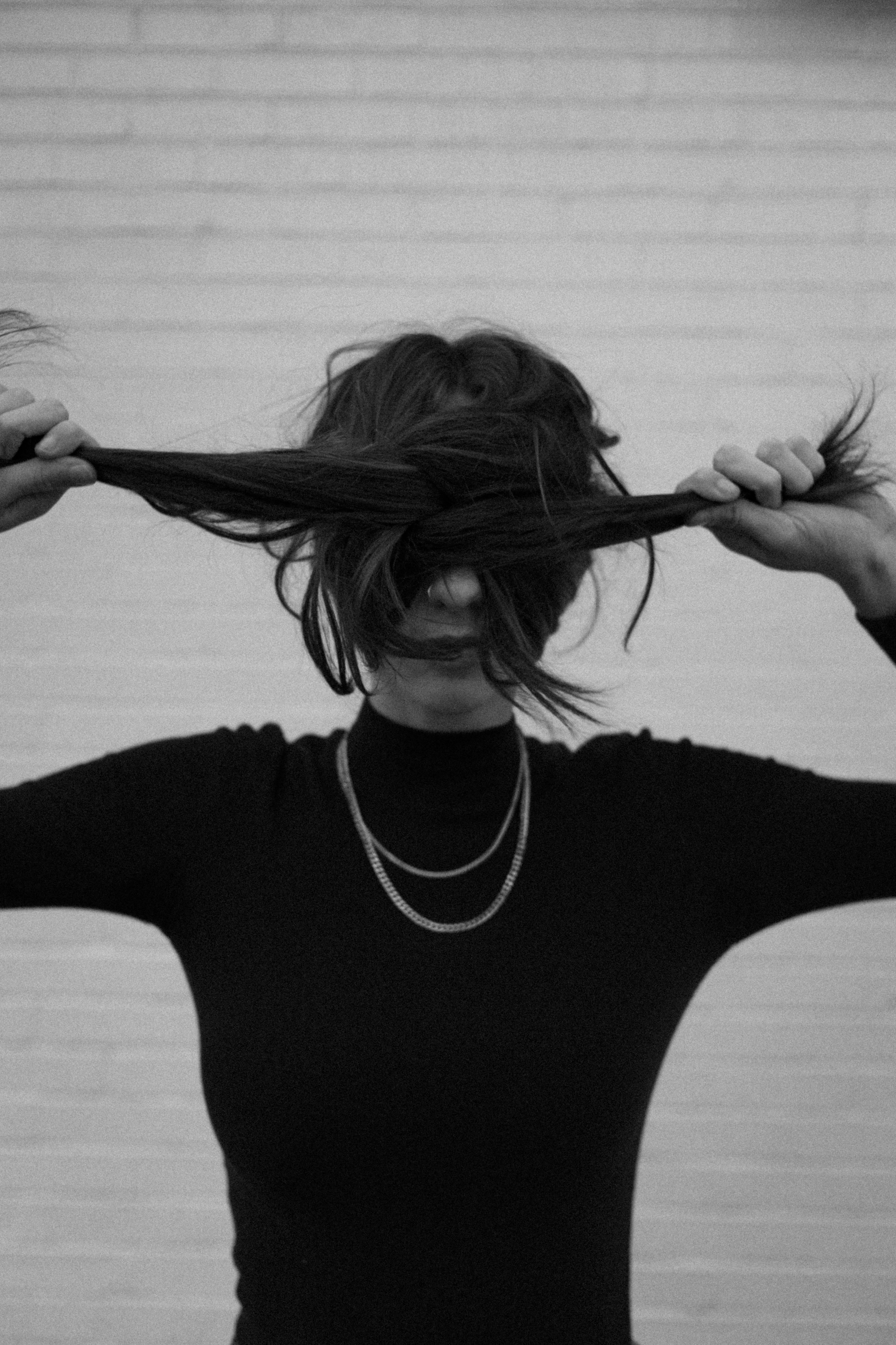 Woman Covering her Face with Hair · Free Stock Photo