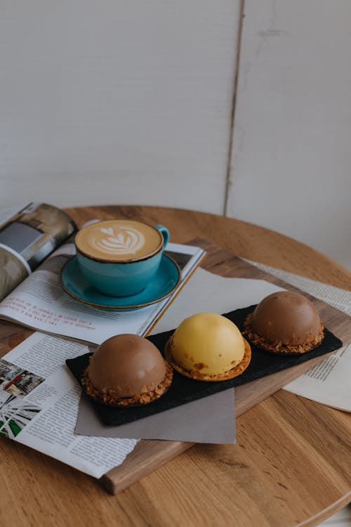 Free Coffee and Cakes on a Table  Stock Photo