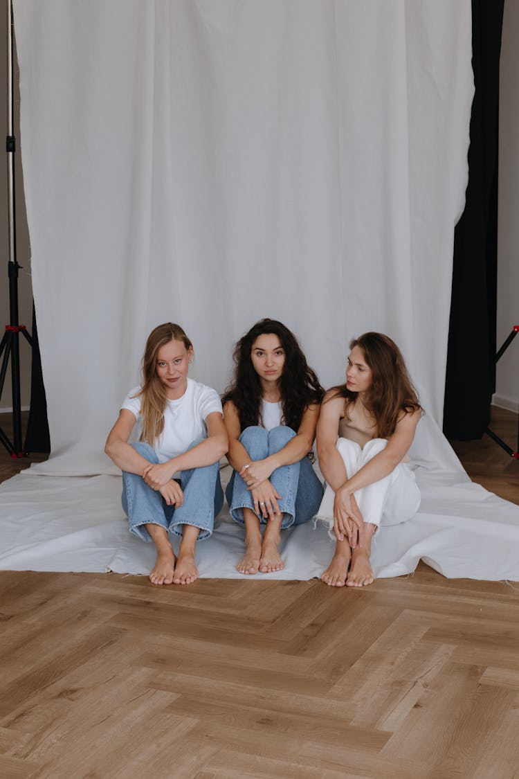 Women Sitting In A Studio 