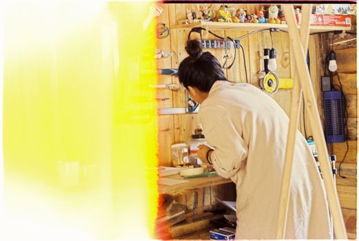 Woman in a Workshop 