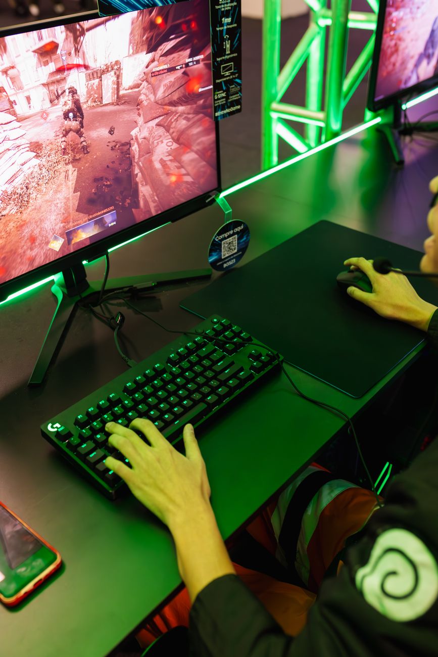 compact small desk gaming setup cyan