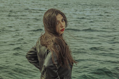 Woman with Long Hair Wearing a Leather Jacket 