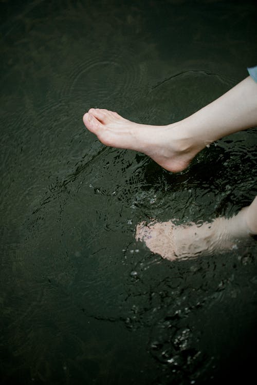 Feet in River