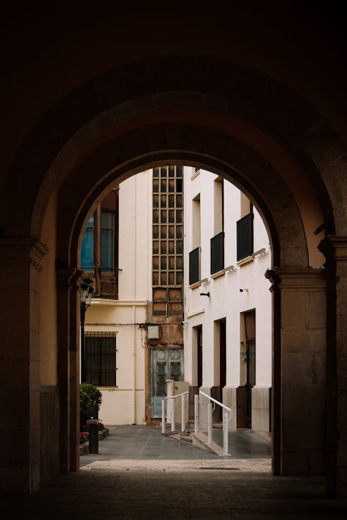 Arched Passage Leading to a Courtyard of a Residential Building
