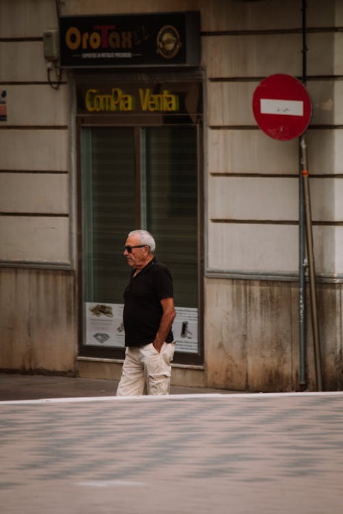 Elderly Man with Sunglasses on Street