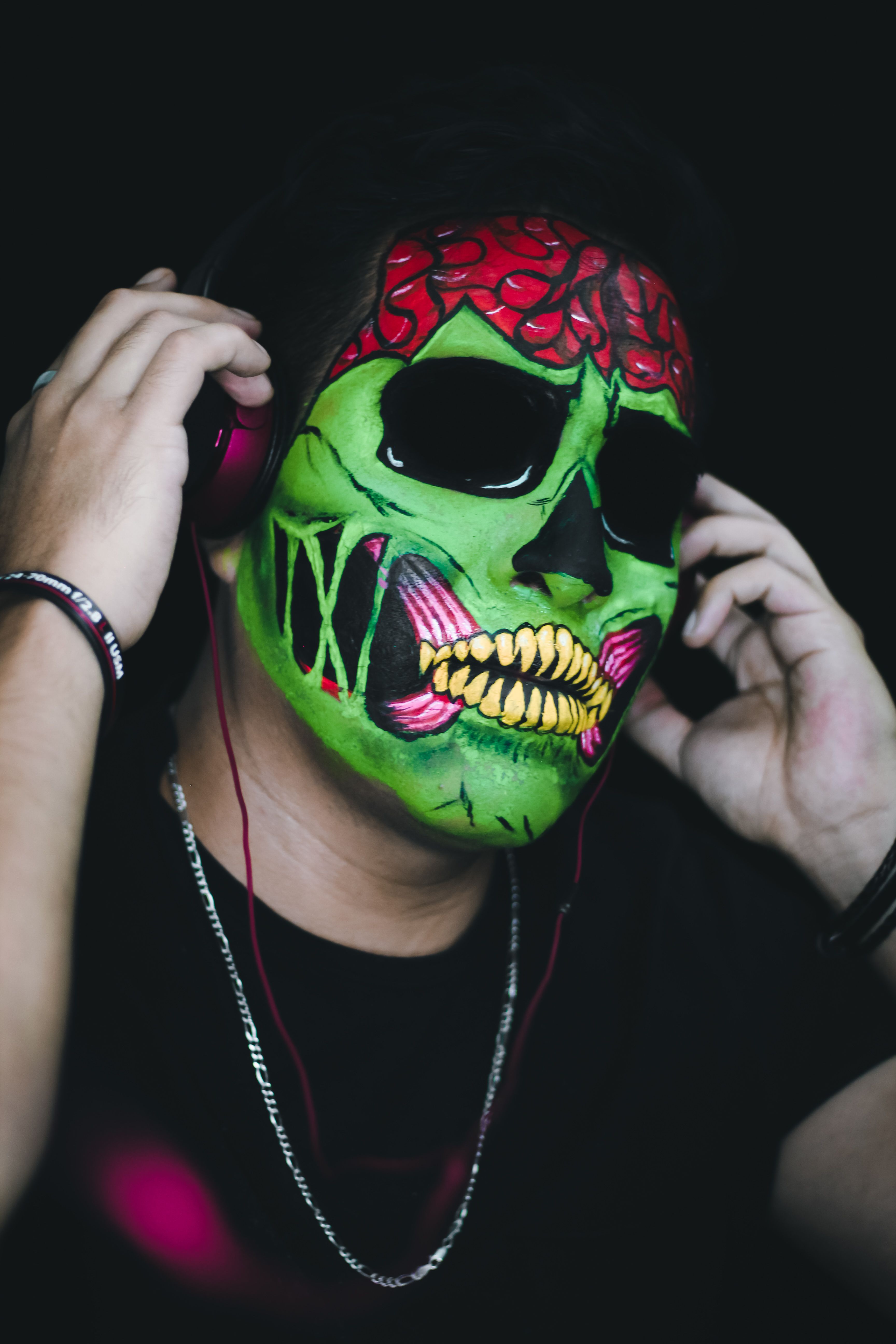 Colorful zombie makeup portrait featuring artistic design, perfect for Halloween celebrations.