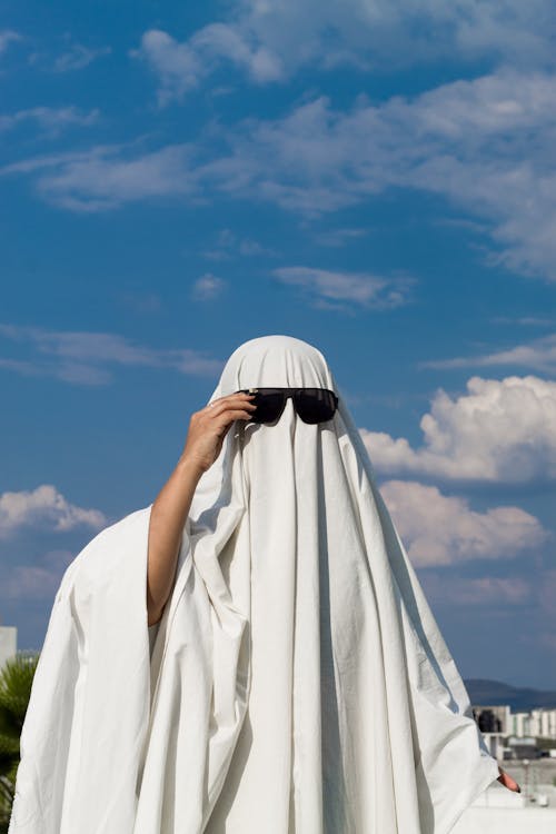 Portrait of Man with a Sheet and Sunglasses 