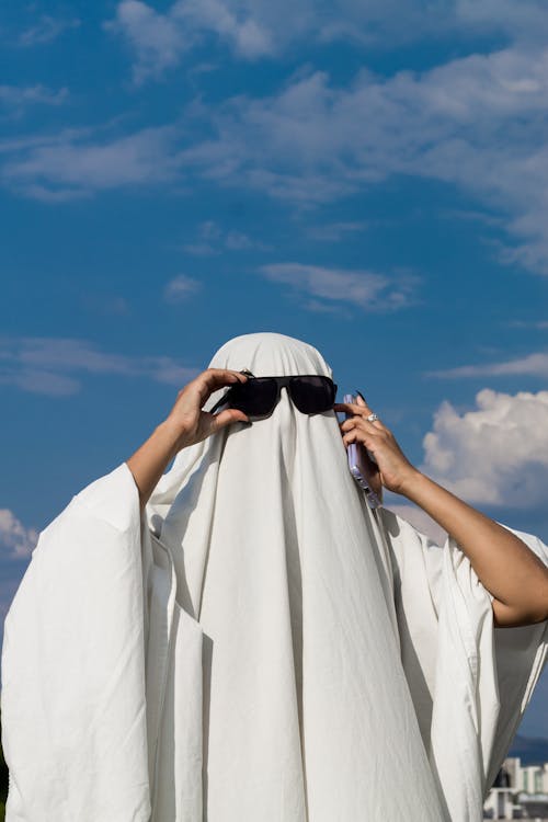 Portrait of Man with a Sheet and Sunglasses 