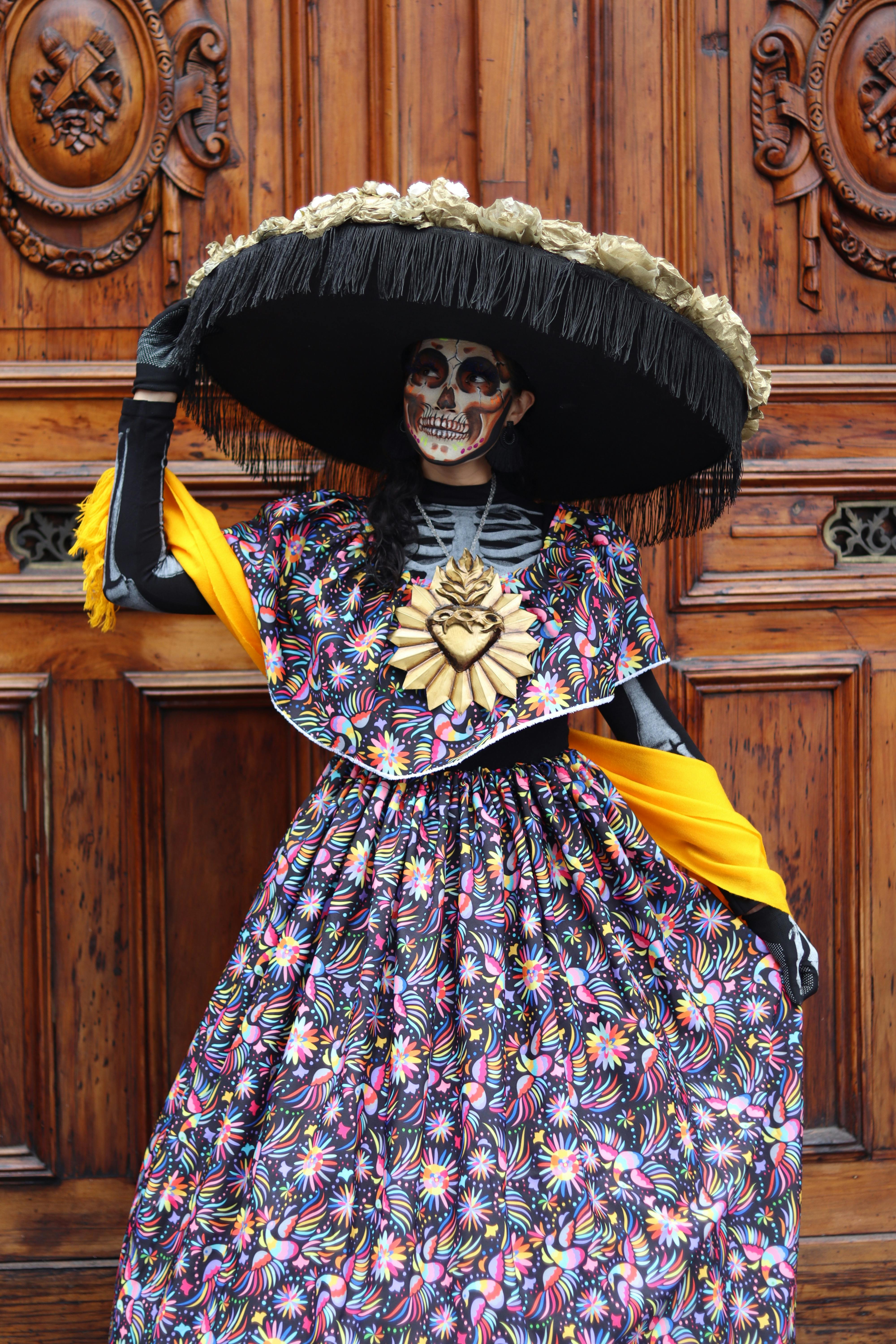 portrait of a woman wearing a day of the dead costume